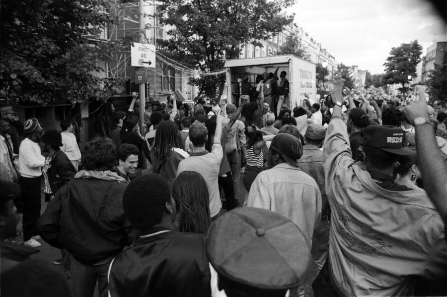 Crowd dancing by a sound system, Notting Hill Carnival, 1989 © Matthew Smith